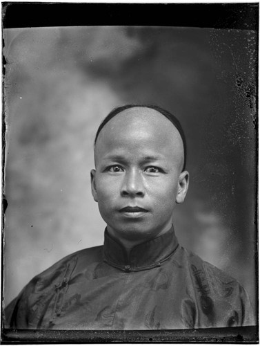 Head-shot portrait of a Chinese man