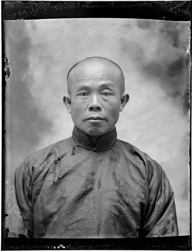 Head-shot portrait of a Chinese man