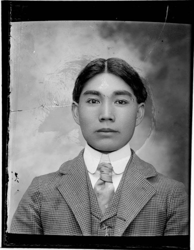 Head-shot portrait of a Chinese man