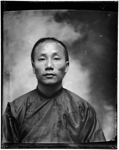 Head-shot portrait of a Chinese man