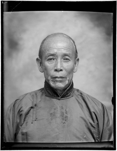 Head-shot portrait of a Chinese man