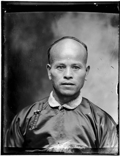Head-shot portrait of a Chinese man