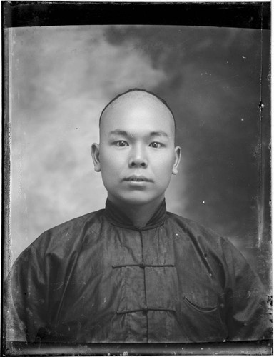 Head-shot portrait of a Chinese man