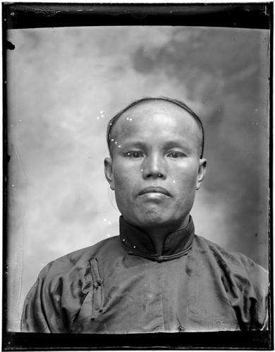 Head-shot portrait of a Chinese man