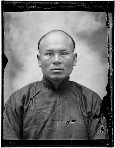 Head-shot portrait of a Chinese man