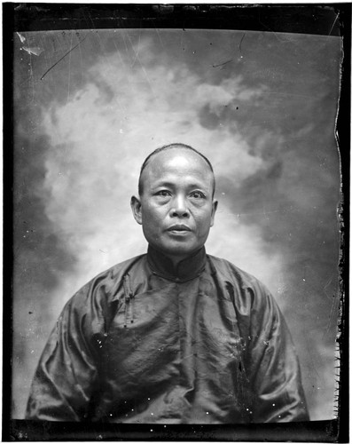 Head-shot portrait of a Chinese man