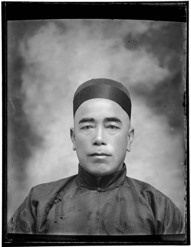 Head-shot portrait of a Chinese man