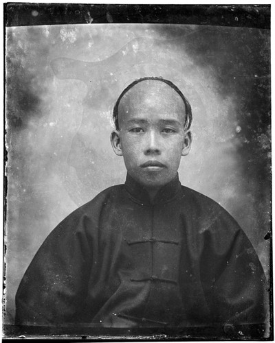 Head-shot portrait of a Chinese man
