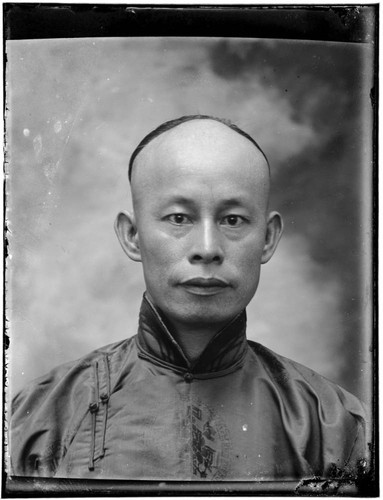 Head-shot portrait of a Chinese man