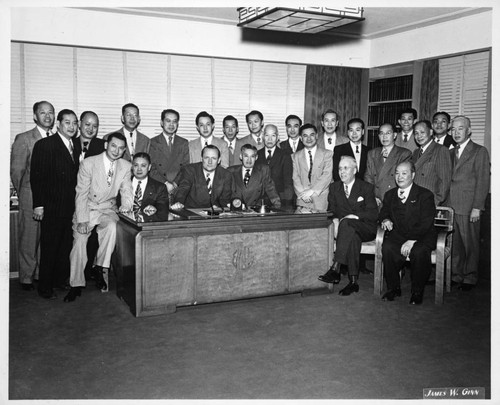 William Knowland and group of men in Y. C. Hong's office