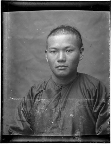 Head-shot portrait of a Chinese man