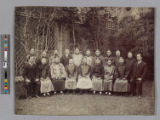 Group portrait of 19 men, Shanghai, China, Chang in business suit (far right)