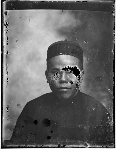 Head-shot portrait of a Chinese man