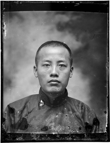 Head-shot portrait of a Chinese man