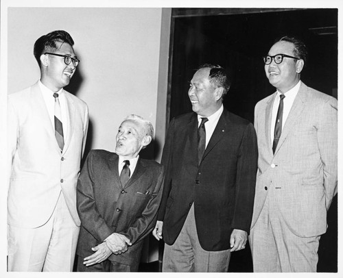 Members of the Chinese American Citizens Alliance, including Jackie Wong Sing, Y. C. Hong, Wilbur K. Woo, and unidentified man