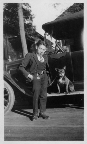 Y. C. Hong and a dog