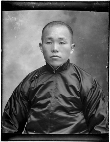 Head-shot portrait of a Chinese man