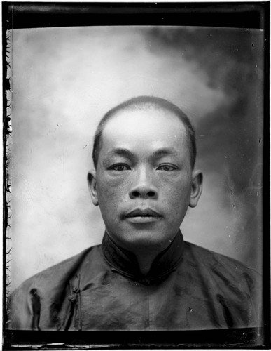 Head-shot portrait of a Chinese man