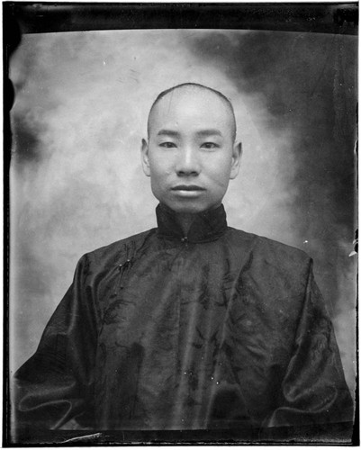 Head-shot portrait of a Chinese man