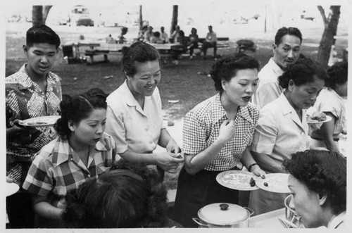 Nowland and Mabel Hong at a group picnic