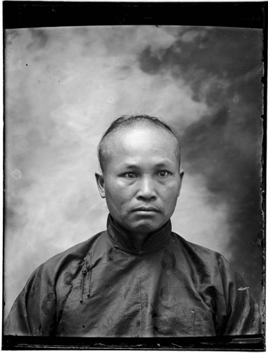 Head-shot portrait of a Chinese man