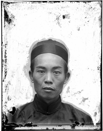 Head-shot portrait of a Chinese man