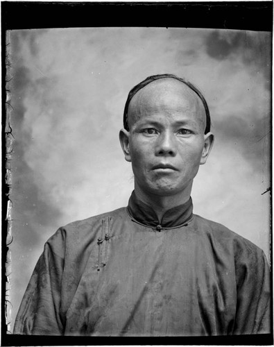 Head-shot portrait of a Chinese man