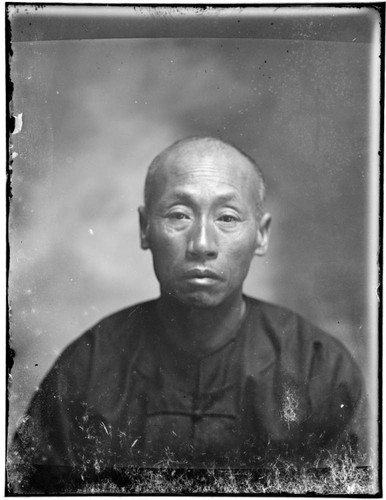 Head-shot portrait of a Chinese man