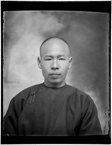 Head-shot portrait of a Chinese man