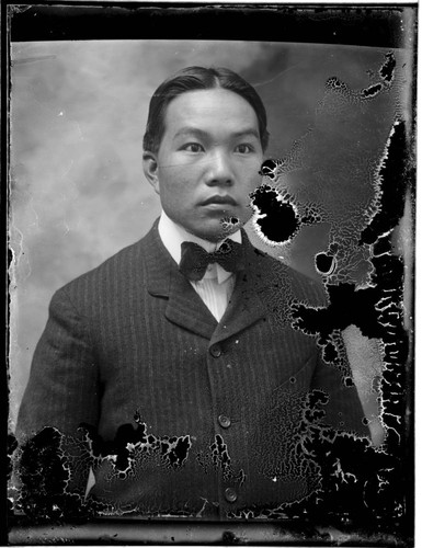 Head-shot portrait of a Chinese man