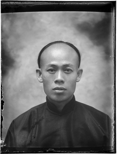 Head-shot portrait of a Chinese man