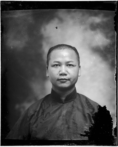 Head-shot portrait of a Chinese man