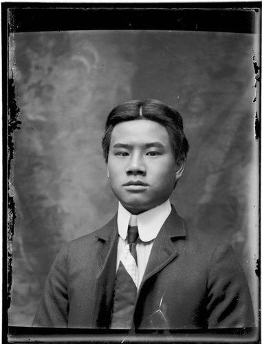 Head-shot portrait of a Chinese man