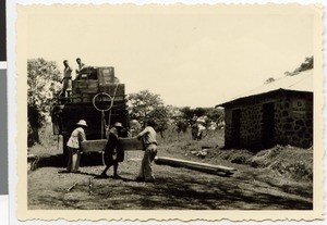 Loading trucks, near Sire, Ethiopia, 1952