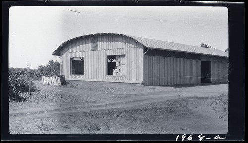 Fruit Packing House, to left of highway some 20 miles south. of Sacramento on Stockton road