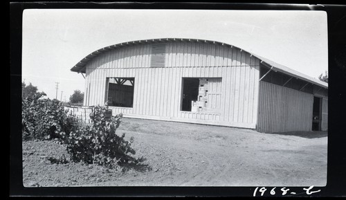 Fruit Packing House, to left of highway some 20 miles south. of Sacramento on Stockton road
