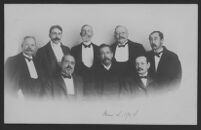 Group portrait of eight men including Takamine, Ryichir Arai and Aoyama on postcard, 1904