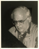 Paul Bley sitting at a piano, Los Angeles, February 1996 [descriptive]