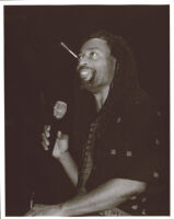 Bobby McFerrin holding a microphone, Los Angeles [descriptive]