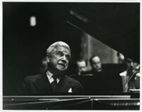 Artur Schnabel playing piano in performance, 1947 [descriptive]