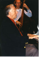 George Shearing playing piano and unidentified man playing double bass, Los Angeles, April 1997 [descriptive]