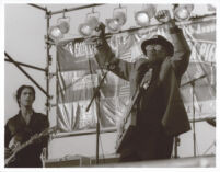 Bo Diddley and an unidentified guitarist performing at the Santa Monica Pier Twilight Dance Series, July 9, 1998 [descriptive]