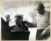 Arthur Rubinstein at the piano with Sergei Koussevitzky, Los Angeles, 1957 [descriptive]