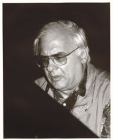 Paul Bley sitting at a piano, Los Angeles, February 1996 [descriptive]