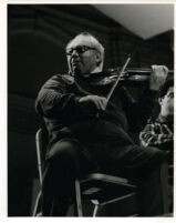 Isaac Stern playing the violin, 1985 [descriptive]