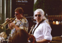 Vinny Golia with a baritone sax and Rob Blakeslee playing flügelhorn, Los Angeles [descriptive]