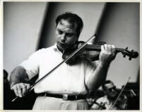 Isaac Stern playing the violin, 1958 [descriptive]