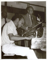 Harold Land playing saxophone and an unidentified man on piano, Los Angeles [descriptive]