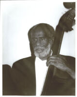 John Heard playing double bass in Los Angeles [descriptive]