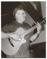 Dori Caymmi playing guitar, Los Angeles, August 1999 [descriptive]